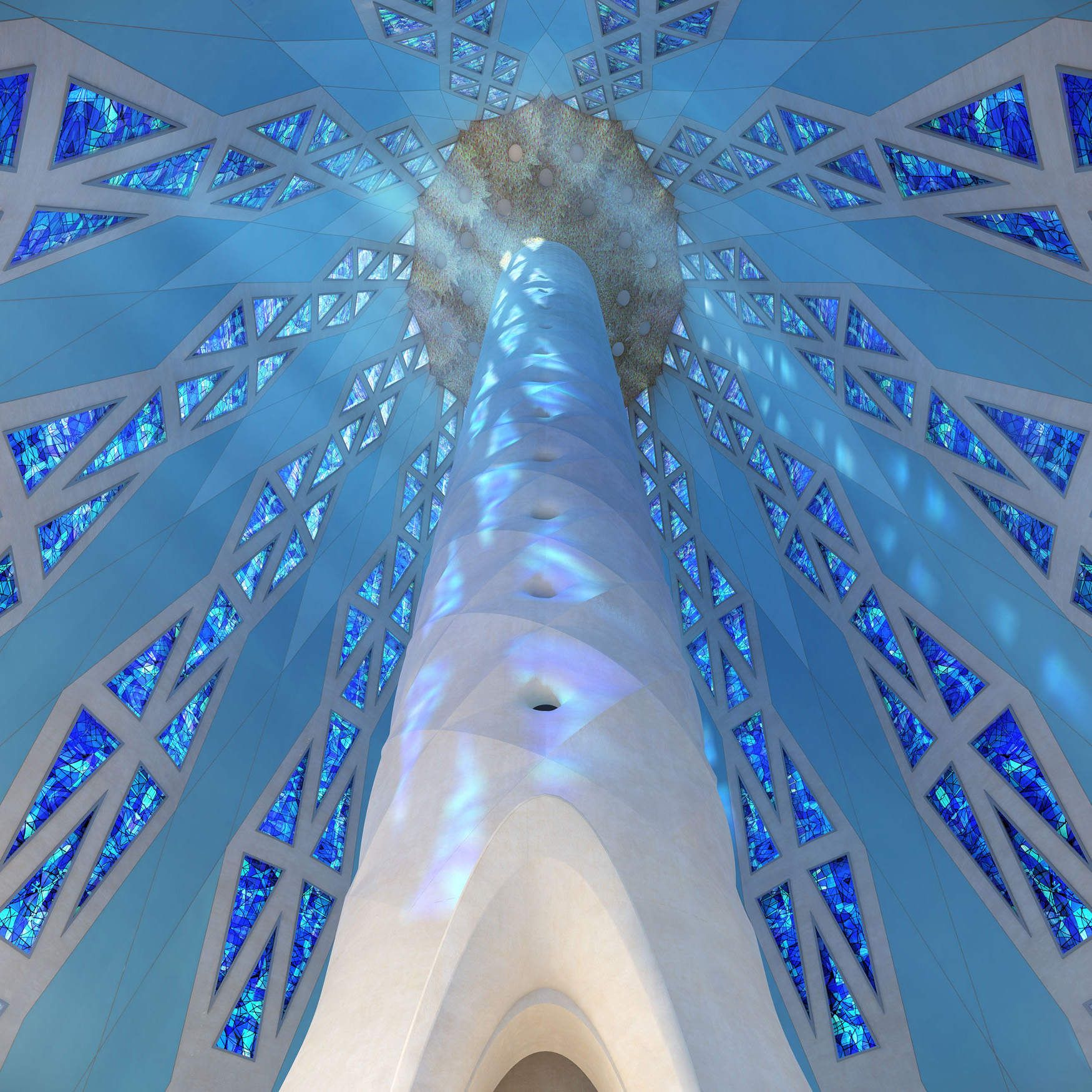 Vista cenital de la columna de la Torre de Jesucristo con reflejos de luz sobre la piedra